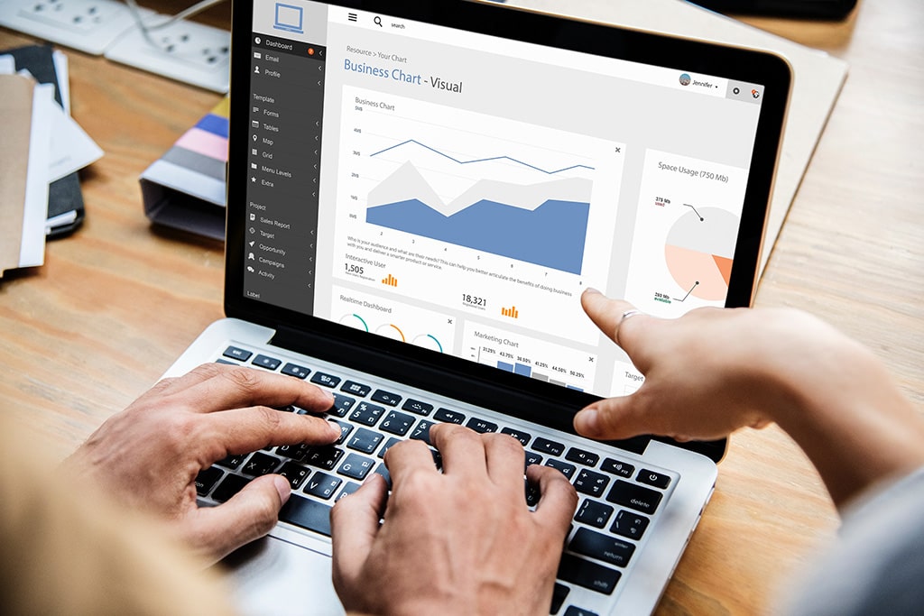 grow business statistics on laptop
